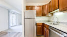 closeup of kitchen cabinets and granite countertops