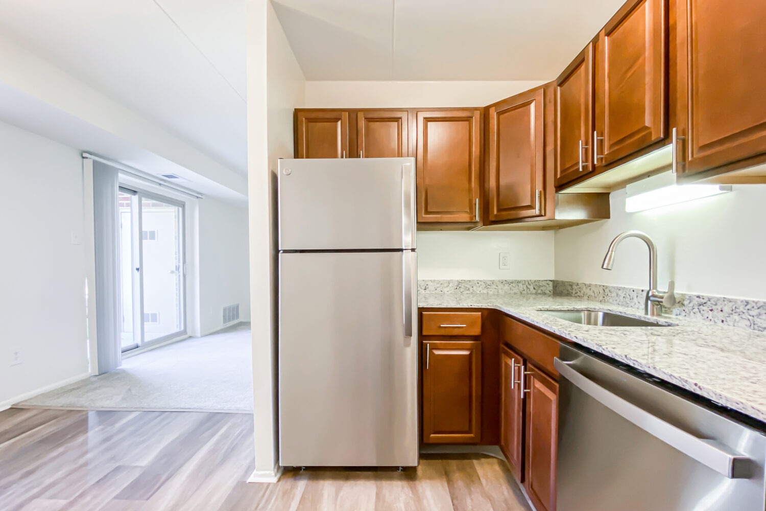 closeup of kitchen cabinets and granite countertops