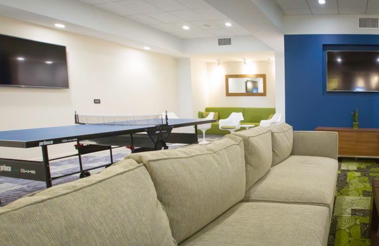 side view of the sofa and ping pong table 