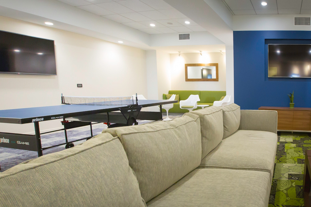 side view of the sofa and ping pong table