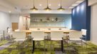 resident lounge with shared kitchen and table to seat 10 