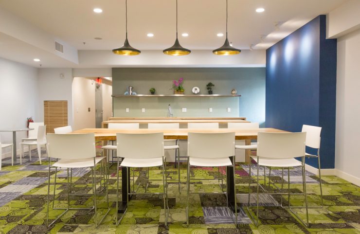 resident lounge with shared kitchen and table to seat 10 