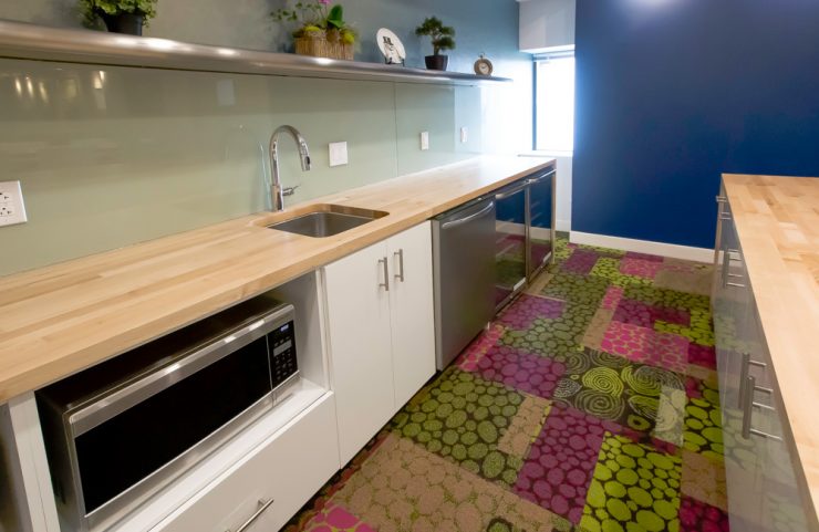resident lounge kitchen with sink, microwave, dishwasher