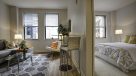 view of the living area and large bedroom 