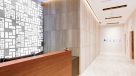 bright lobby with 24 hour concierge desk