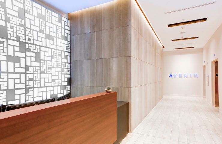 bright lobby with 24 hour concierge desk