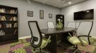 conference room with books to read and flat screen tv