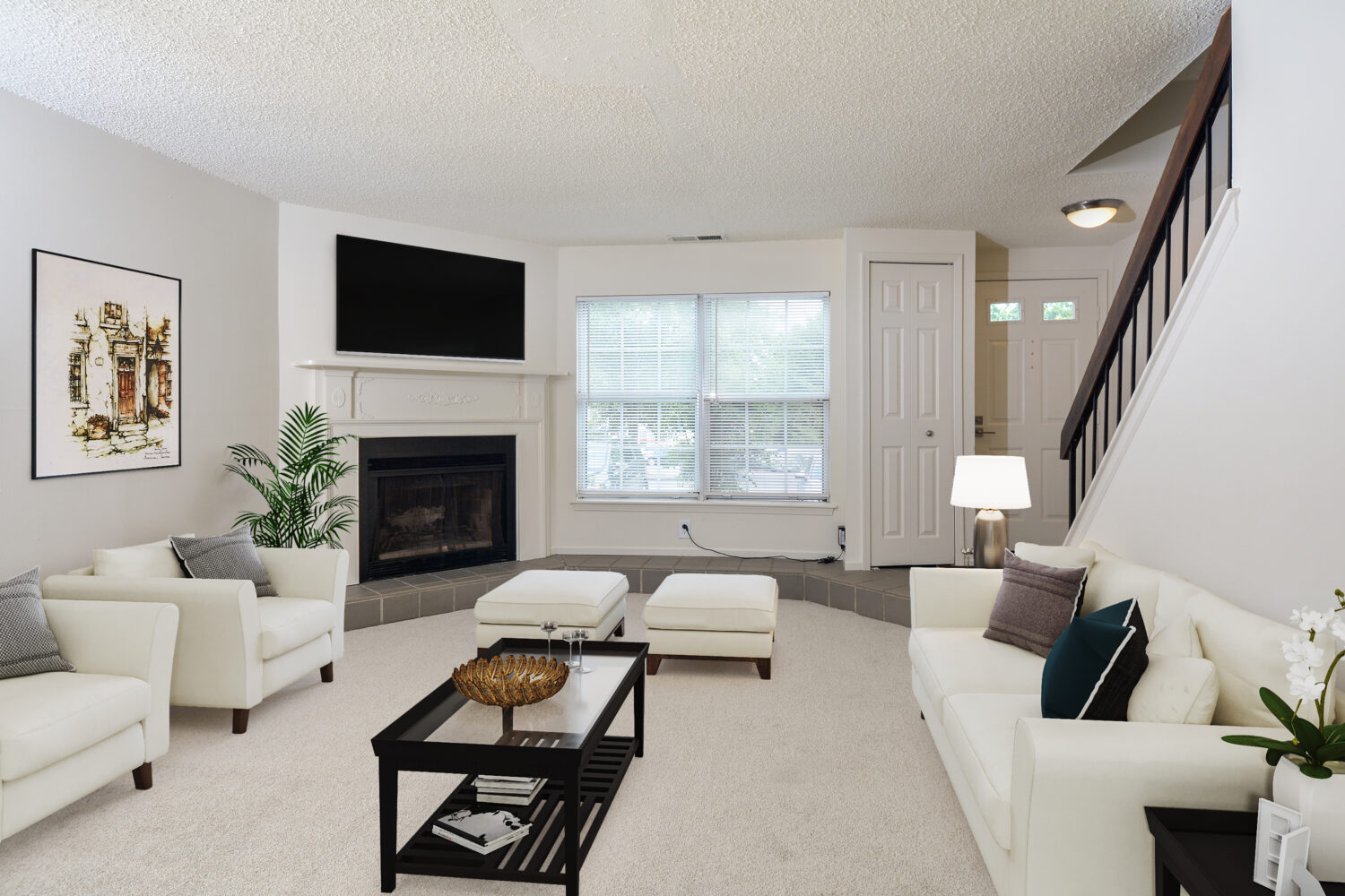 carpeted living room with a wood burning fireplace 