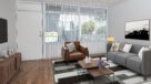 large living room with plank flooring