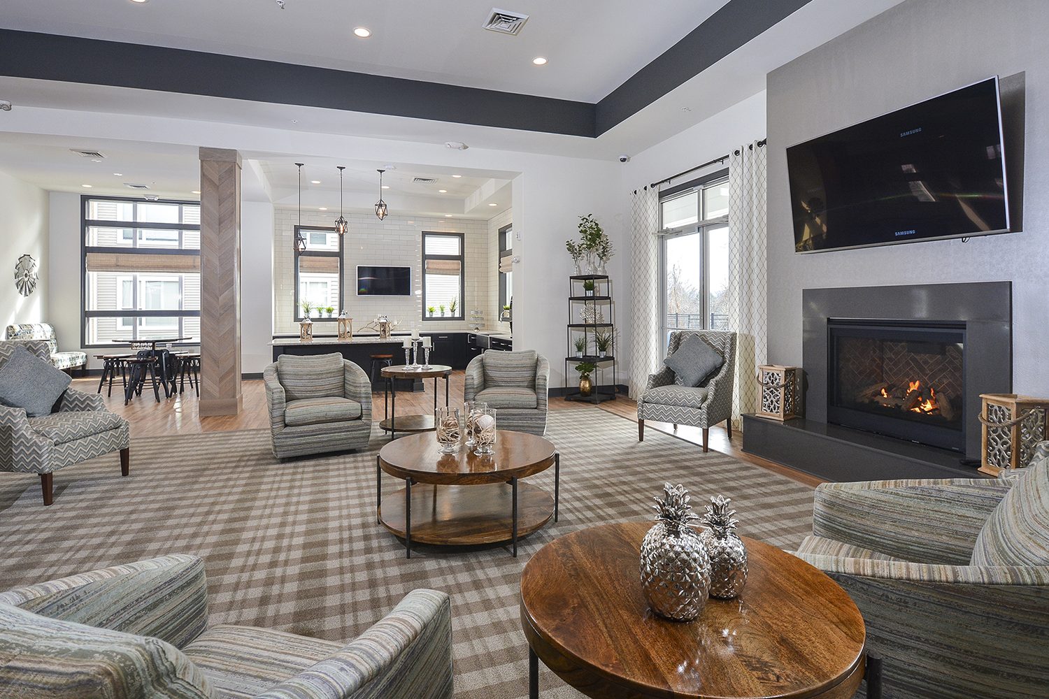 lounge area with a fireplace in community center 