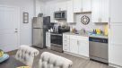 modern kitchen with white cabinets 