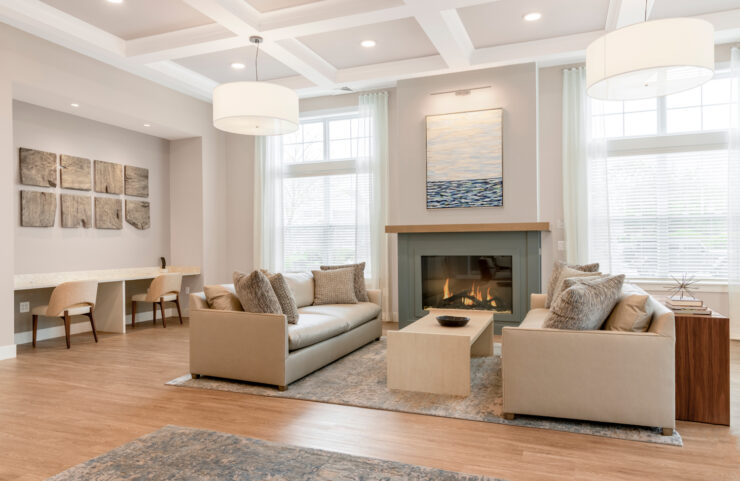 modern large clubhouse with fireplace and cozy seating