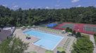 aerial view of the pool and tennis courts 
