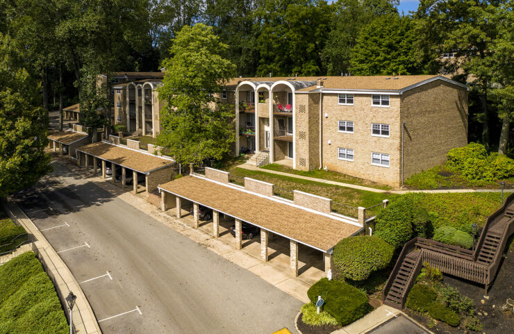 aerial view of exterior apartments and carports 
