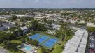 aerial view of set point, 3 tennis courts and the pool