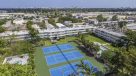 aerial view of 3 tennis courts