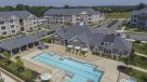 aerial view of the outdoor pool and clubhouse 