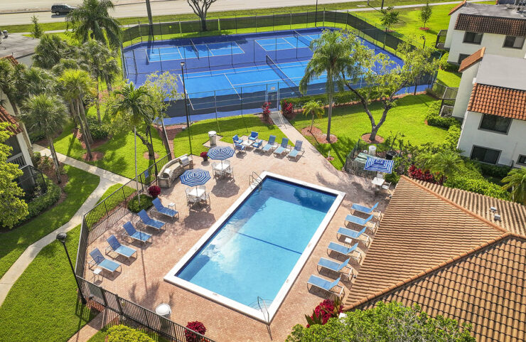 heated swimming pool with lounge chairs 