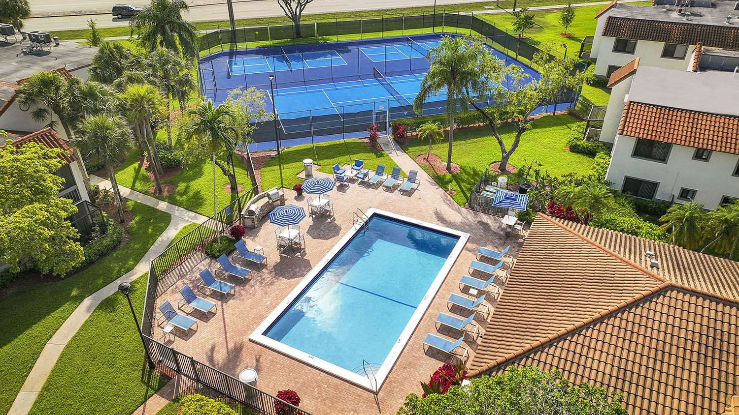 heated swimming pool with lounge chairs 
