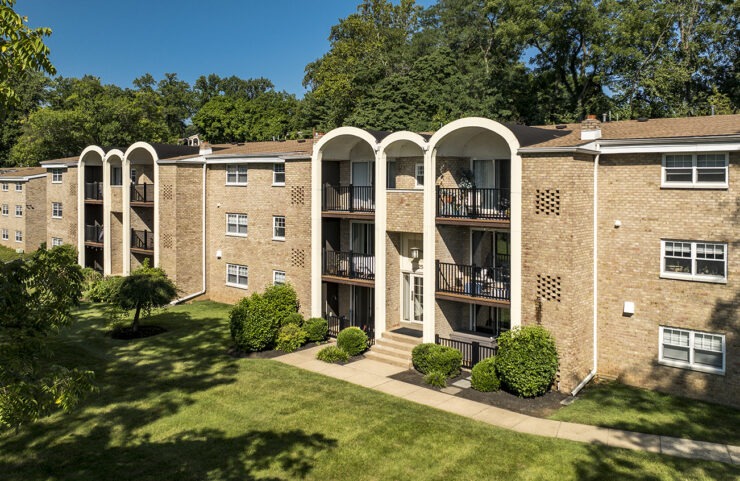 aerial view of exterior apartments and carports 