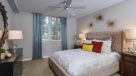 large bedroom with ceiling fan 