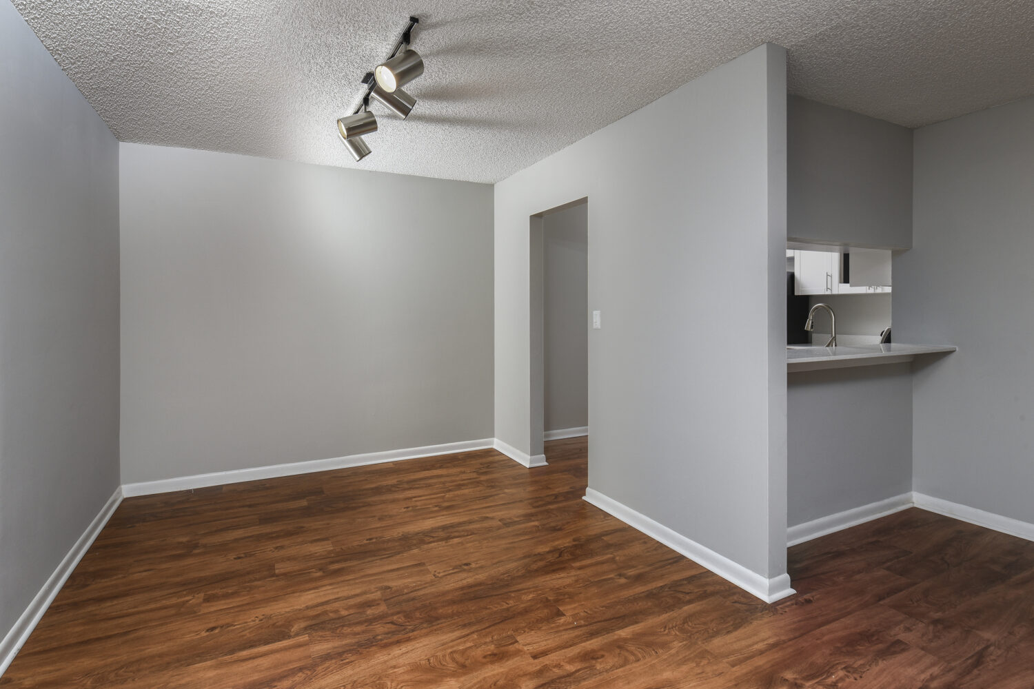 dining area with plank flooring