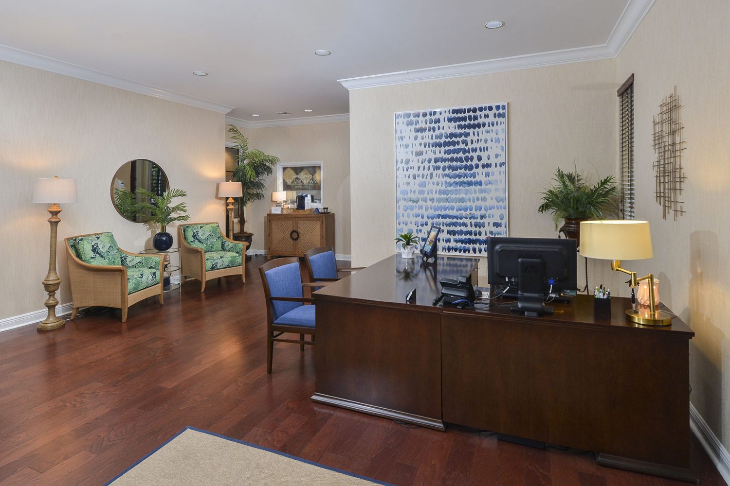 leasing office desk with seating area 