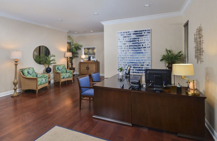 leasing office desk with seating area 