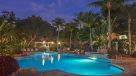 outdoor pool lit up at night