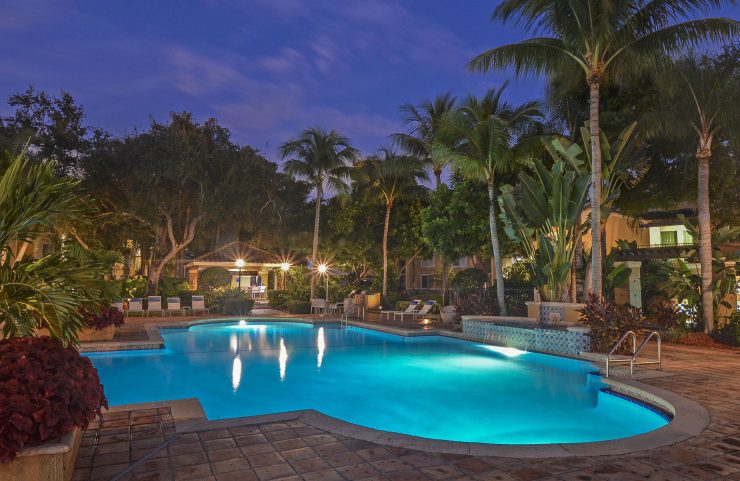 outdoor pool lit up at night