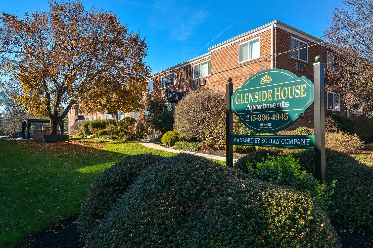 corner angle with signage and exterior in the background