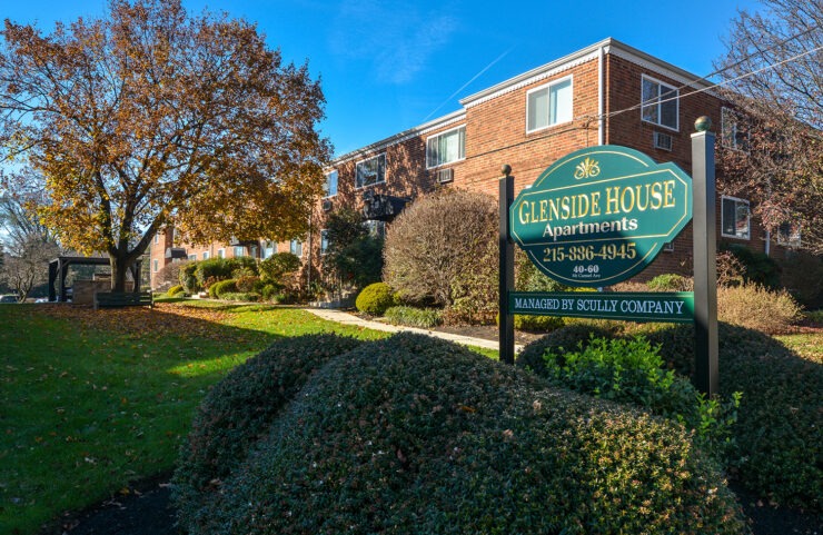 corner angle with signage and exterior in the background