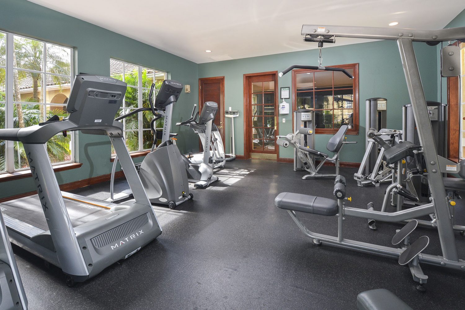 cardio equipment and weight machines in the fitness center 