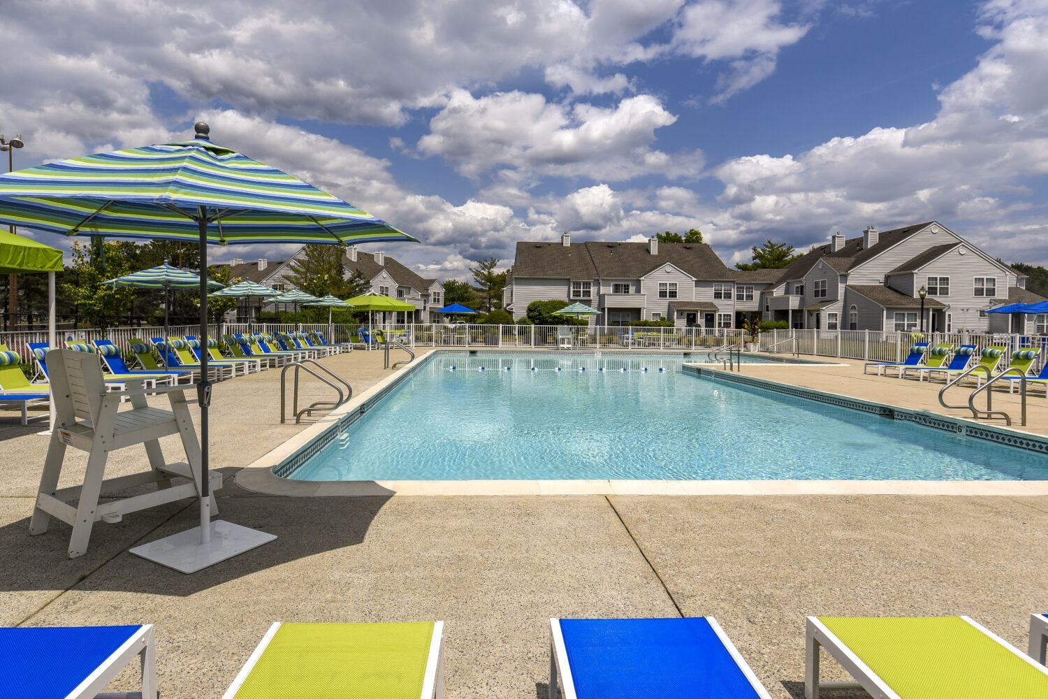 pool with lots of lounge chairs