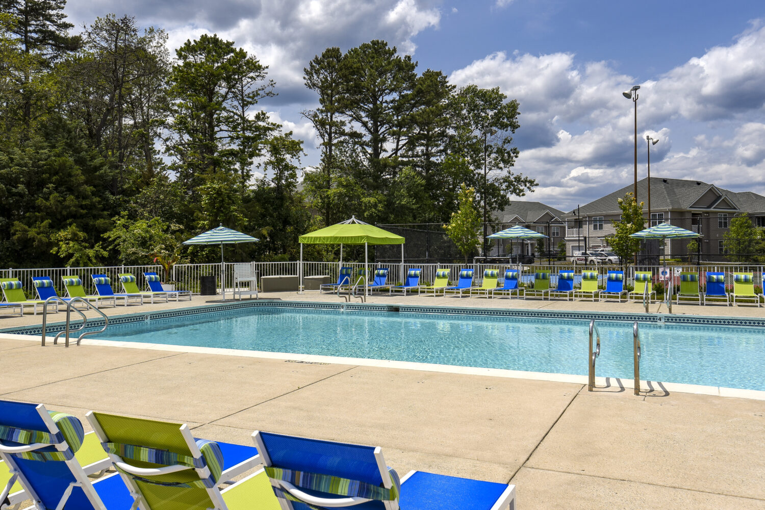 Outdoor Pool with Plenty of Seating Options
