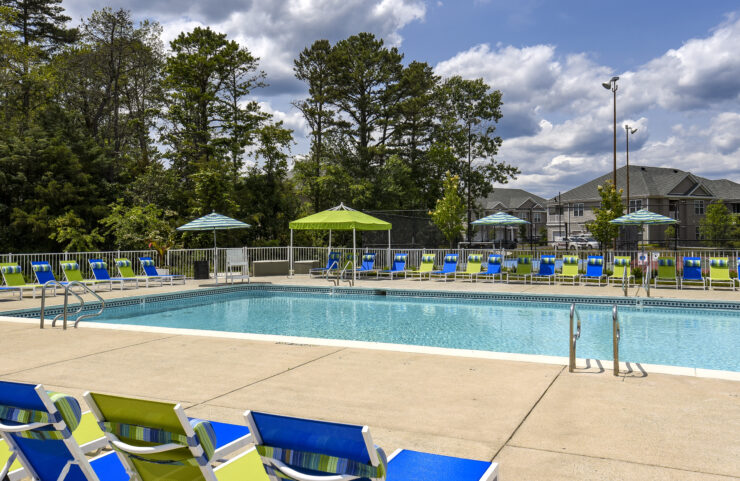 Outdoor Pool with Plenty of Seating Options
