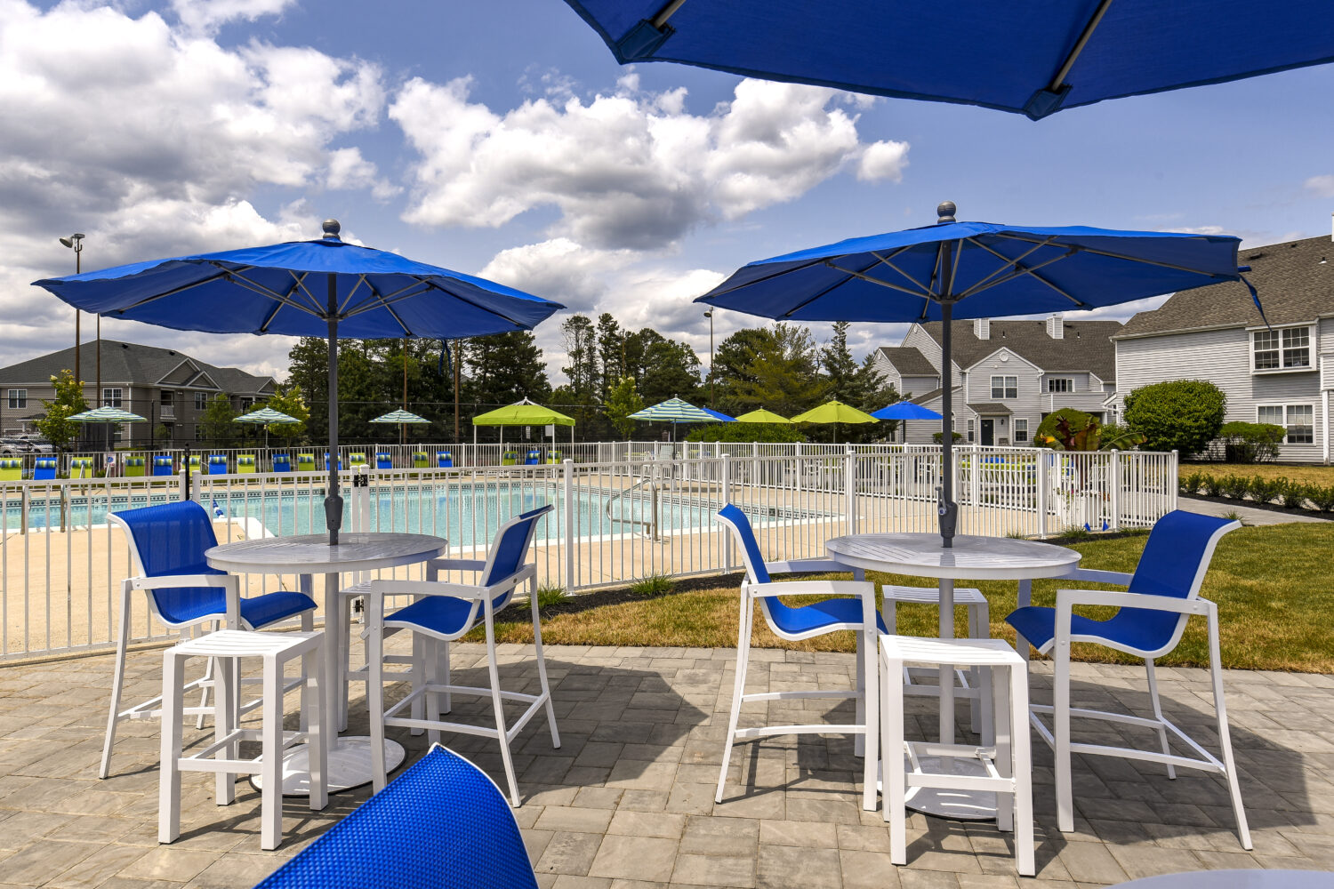 Poolside umbrella tables for Relaxing and Socializing
