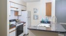 standard kitchen with white appliances 