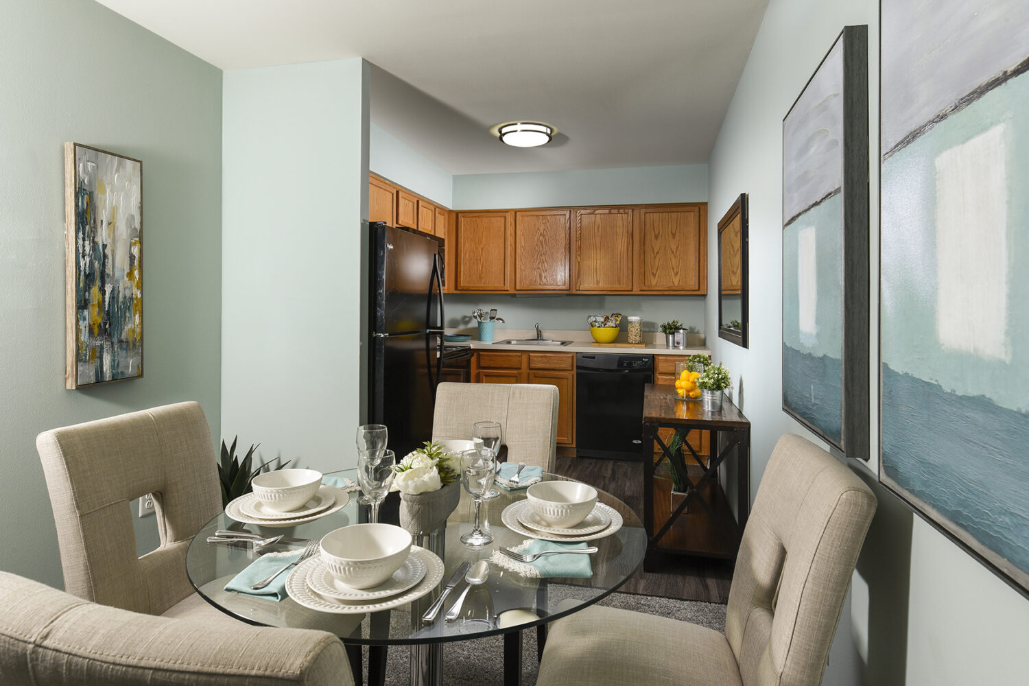 dining and kitchen area with oak cabinets 