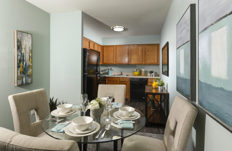 dining and kitchen area with oak cabinets 