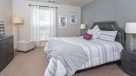 bedroom with large window 