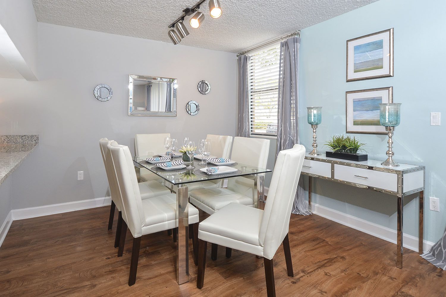 dining room with plank flooring 