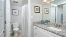 large white vanity outside the bathroom 