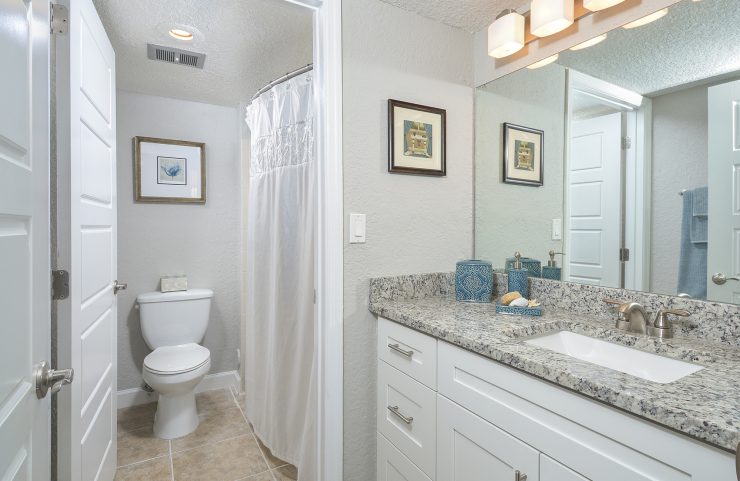 large white vanity outside the bathroom 