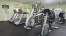 treadmills, elliptical and bike machines in fitness center 