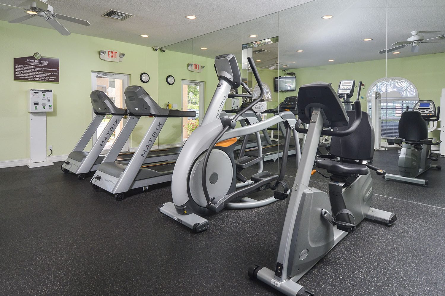 treadmills, elliptical and bike machines in fitness center 