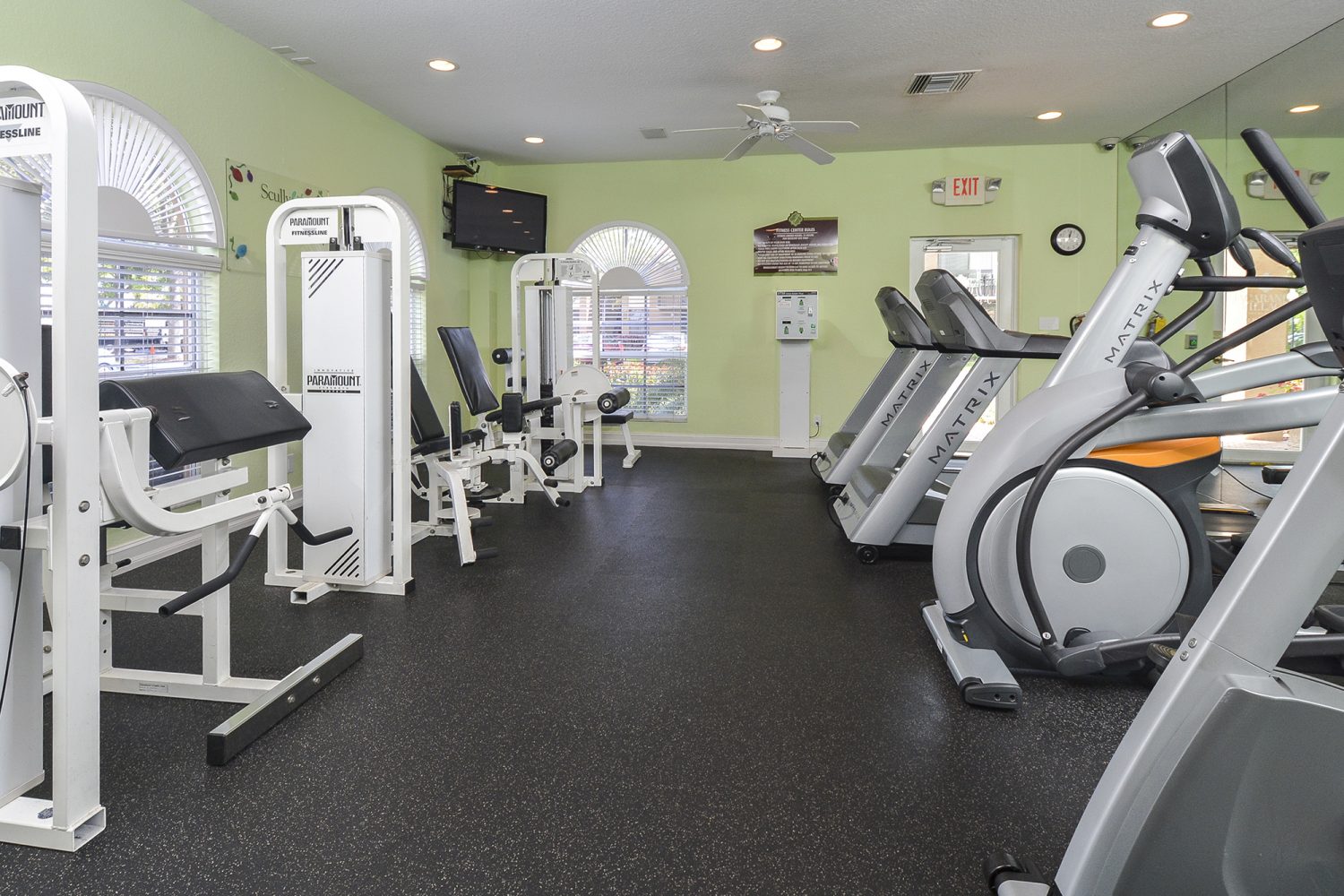 strength training and cardio machines in fitness center 
