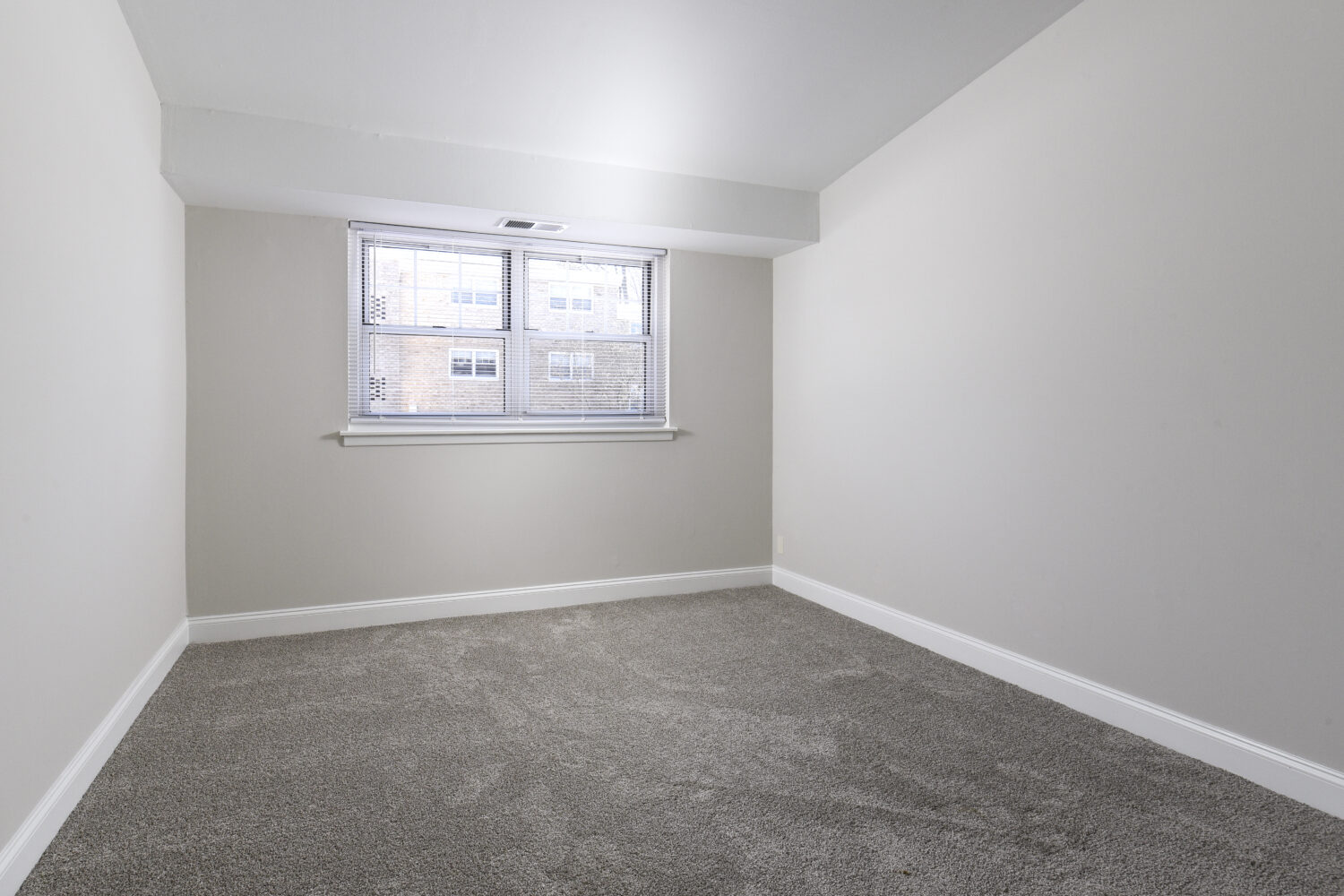 bedroom with wall to wall carpet