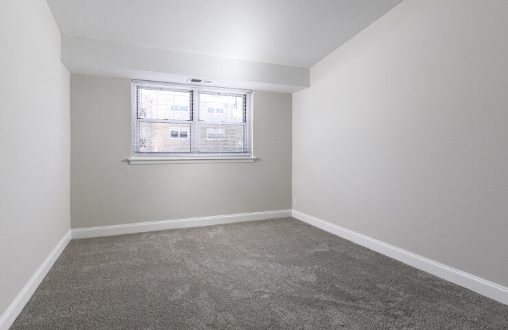 bedroom with wall to wall carpet