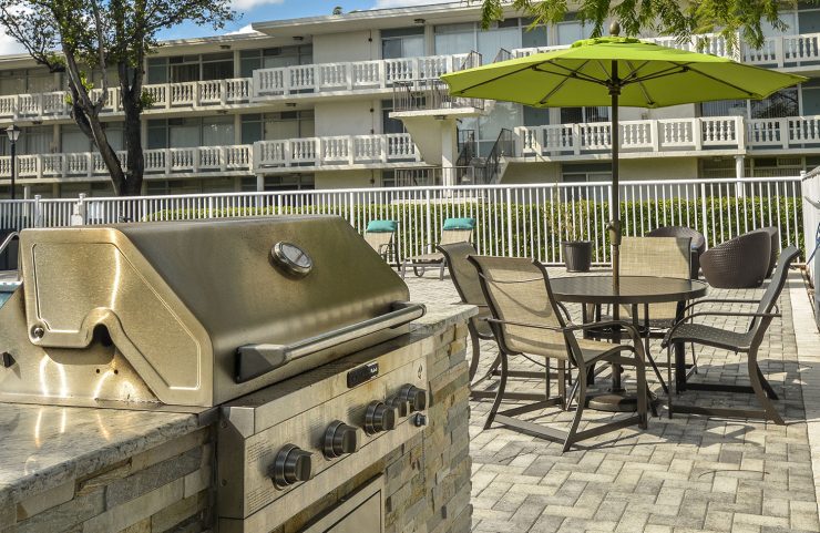 grilling area with umbrella tables 